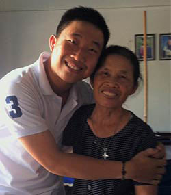 Hoang Do hugs his mom