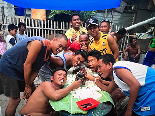 Group of friends in the Philippines Filipino friends making funny faces at the camera