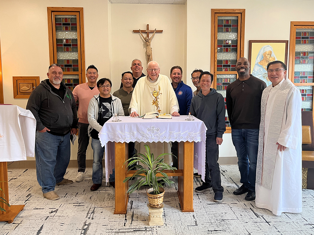 Divine Word Seminary - East Troy pose with Fr. Bill Shea, SVD at the altar